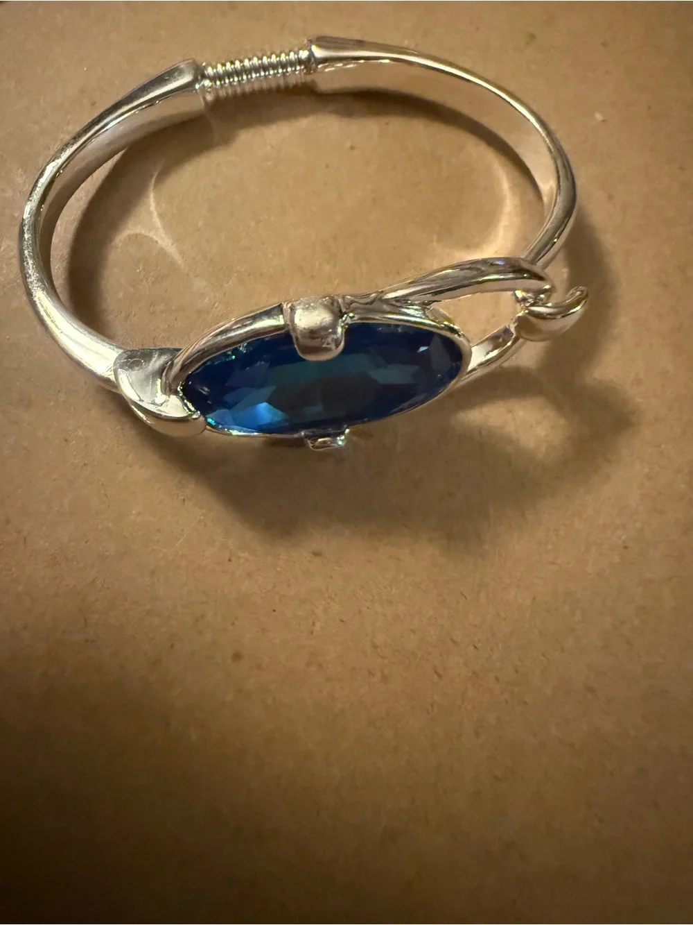 Uno de 50 bangle bracelet with faceted blue crystal